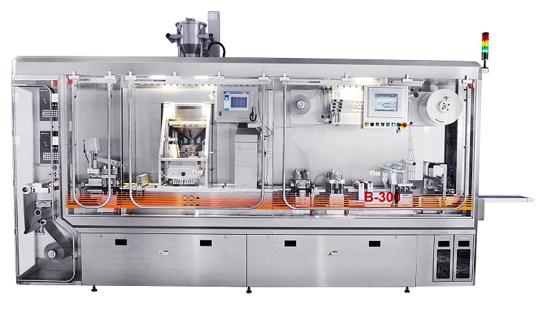 Contained blister machine